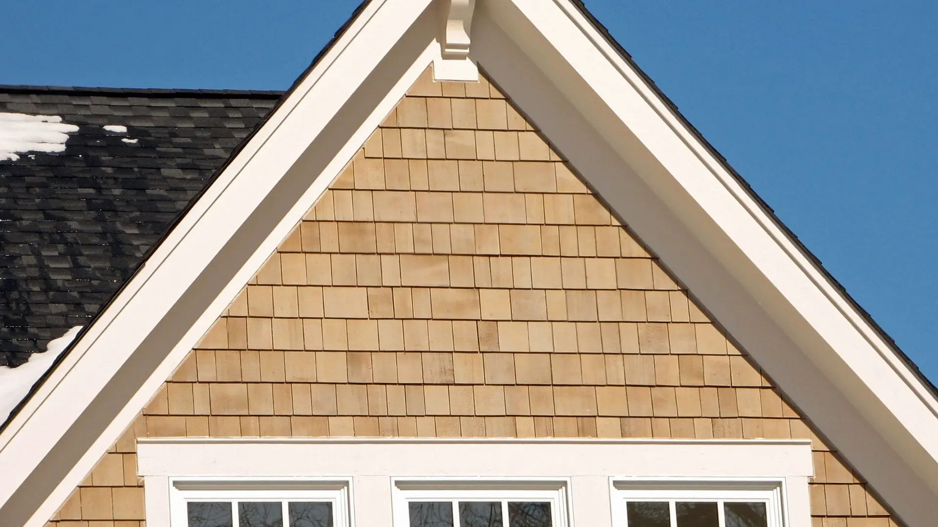 Roof peak with wood siding detail