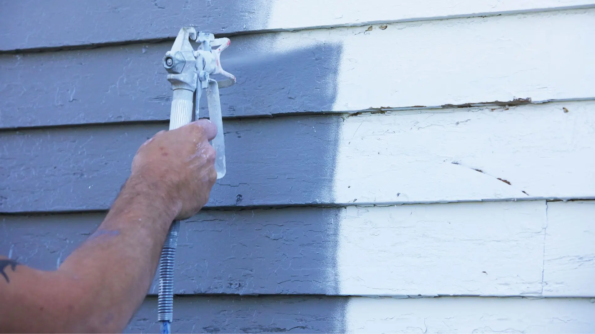 Spray painting house exterior gray