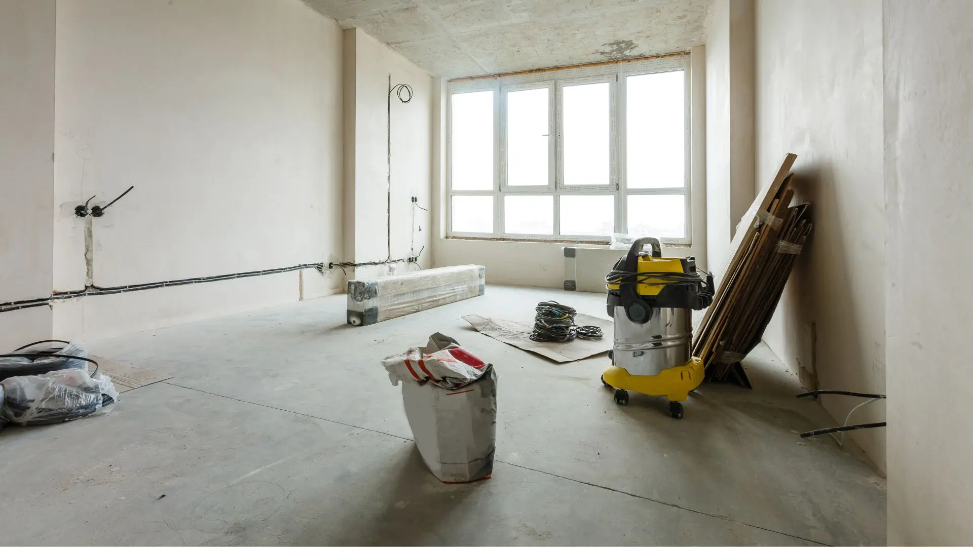 Renovation site with vacuum and supplies